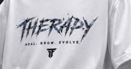 Front logotype macro: slashed THERAPY lettering